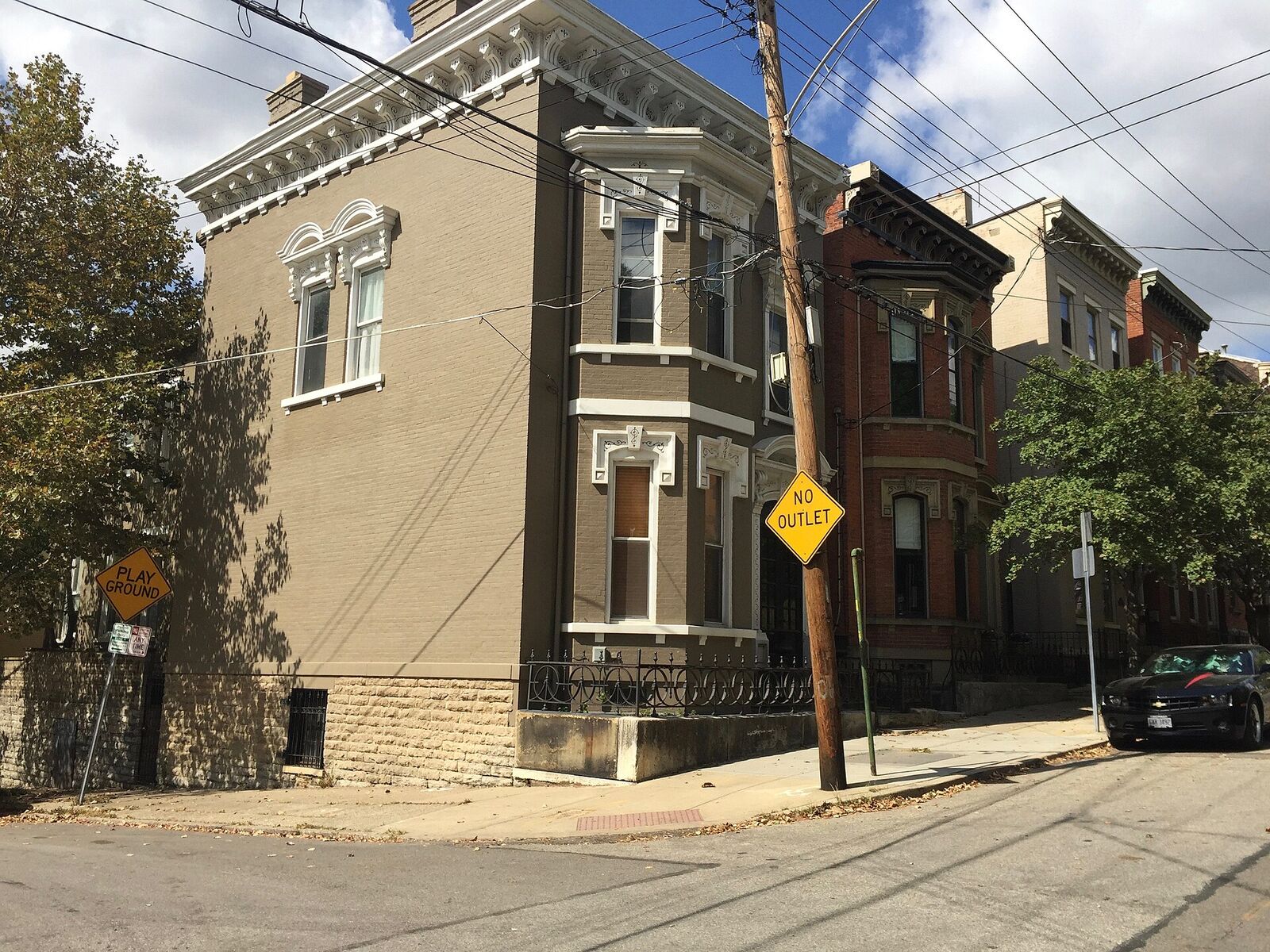 Restored Italianate rowhouses on Broadway Street in Pendleton, Cincinnati.